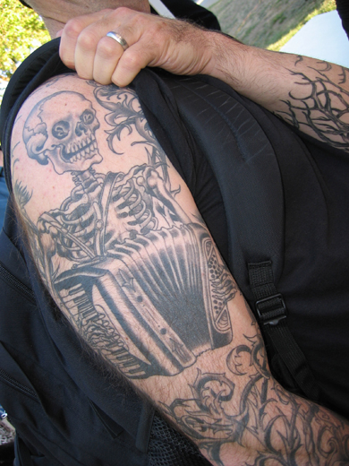 andrew's skull and accordion tatoo