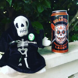 Beanie Baby Death with Lager can on porch railing